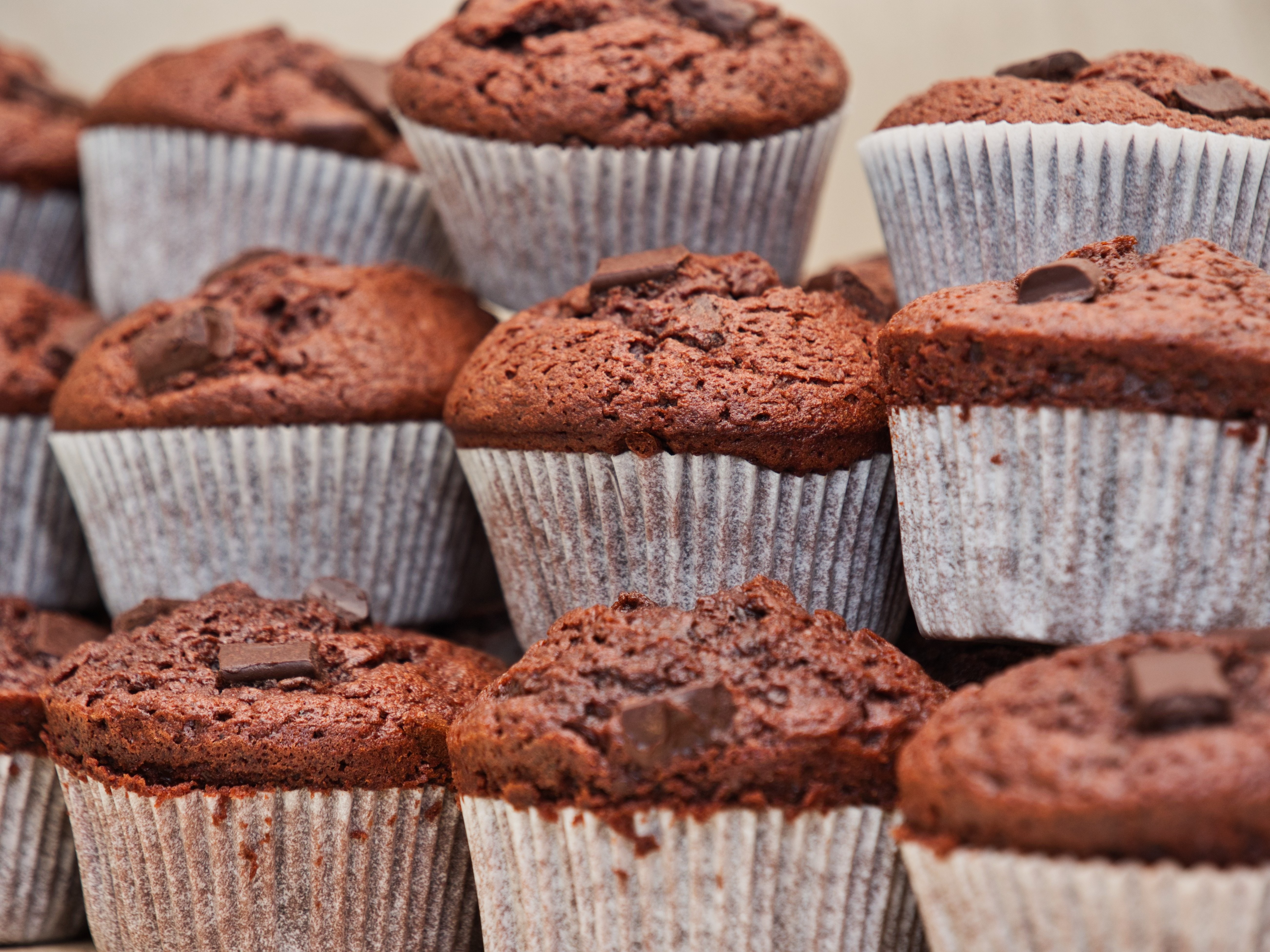 A stack of double chocolate chip muffins.